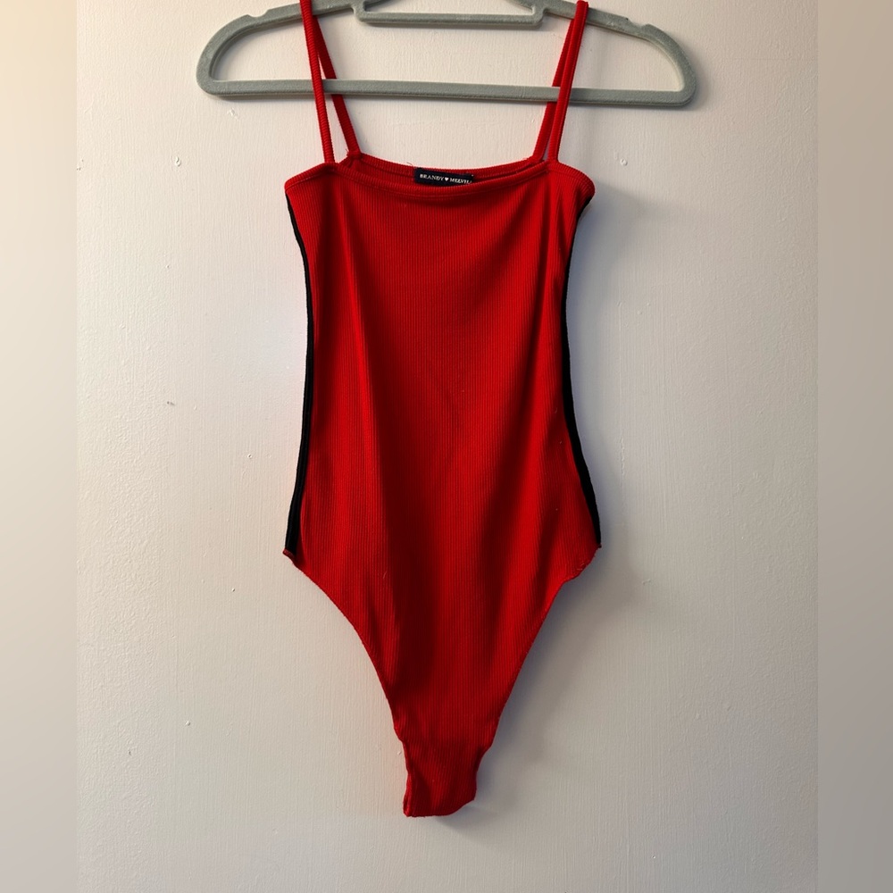 Red bodysuit with black stripes